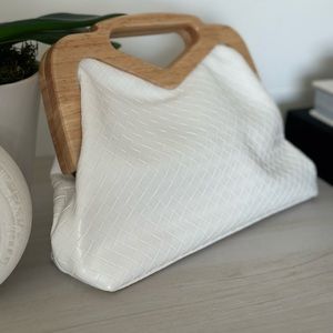 White braided vegan leather clutch with wood handle & optional gold chain strap.